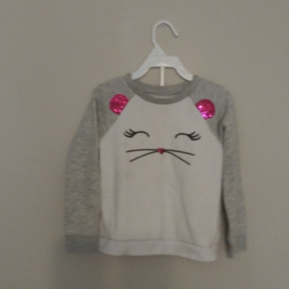 Gray and white sweater